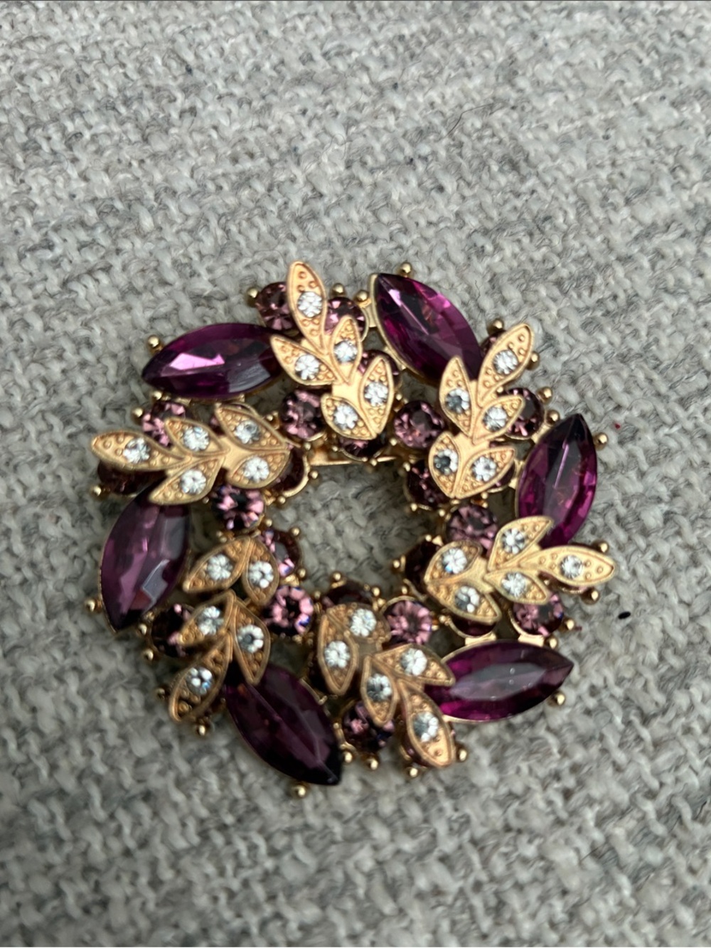 Elegant Purple Crystal Wreath Brooch with Gold Tones